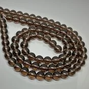 17” Smokey Quartz deals triple strand intertwined with gold filled tubes.